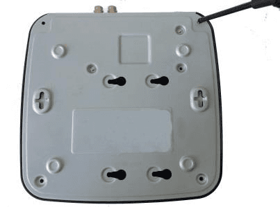 Removing the cover screws from the bottom of a Smart 1U DVR with a screwdriver