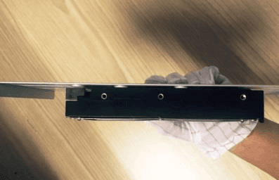 HDD placed onto the removed mounting bracket
