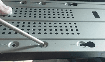 Screws fixing the HDD onto the bracket