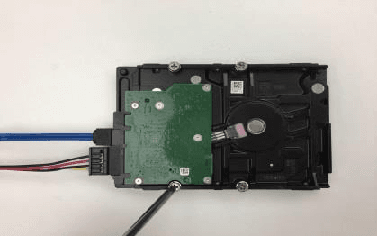 HDD cable and power cable connected to the HDD with its screws fastened