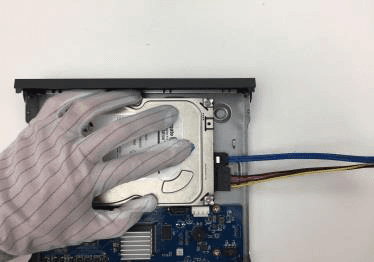 HDD screws aligned with the holes on the back of the device