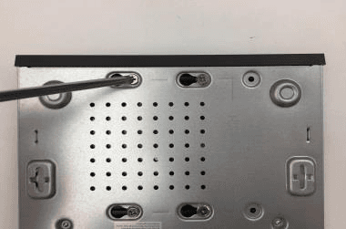 Device turned upside down to fasten the HDD screws