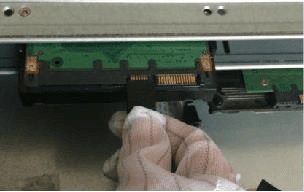 One end of the HDD cable connected to the HDD