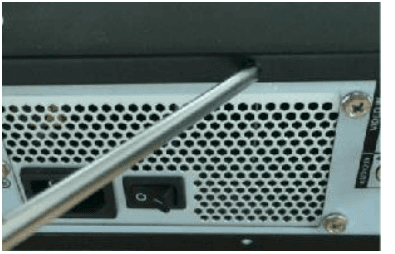 Removing the screws on the 2U cover with a screwdriver