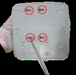 Bottom of the chassis with the four HDD screws highlighted and a screwdriver