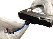 HDD with the data and power cables connected to its rear connectors