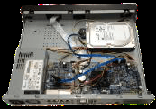 HDD connected with data and power cables inside the 1U chassis